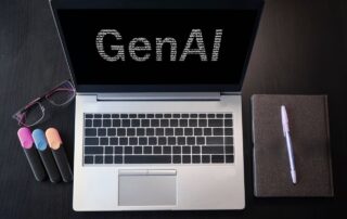 Laptop displaying GenAI, symbolizing AI’s role in modern coaching